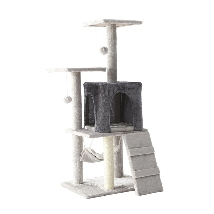 Cat tower with a sisal scratching post, which wears claws down between uses of cat nail clippers